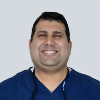 A headshot photo of Dr. Rush Hejazi